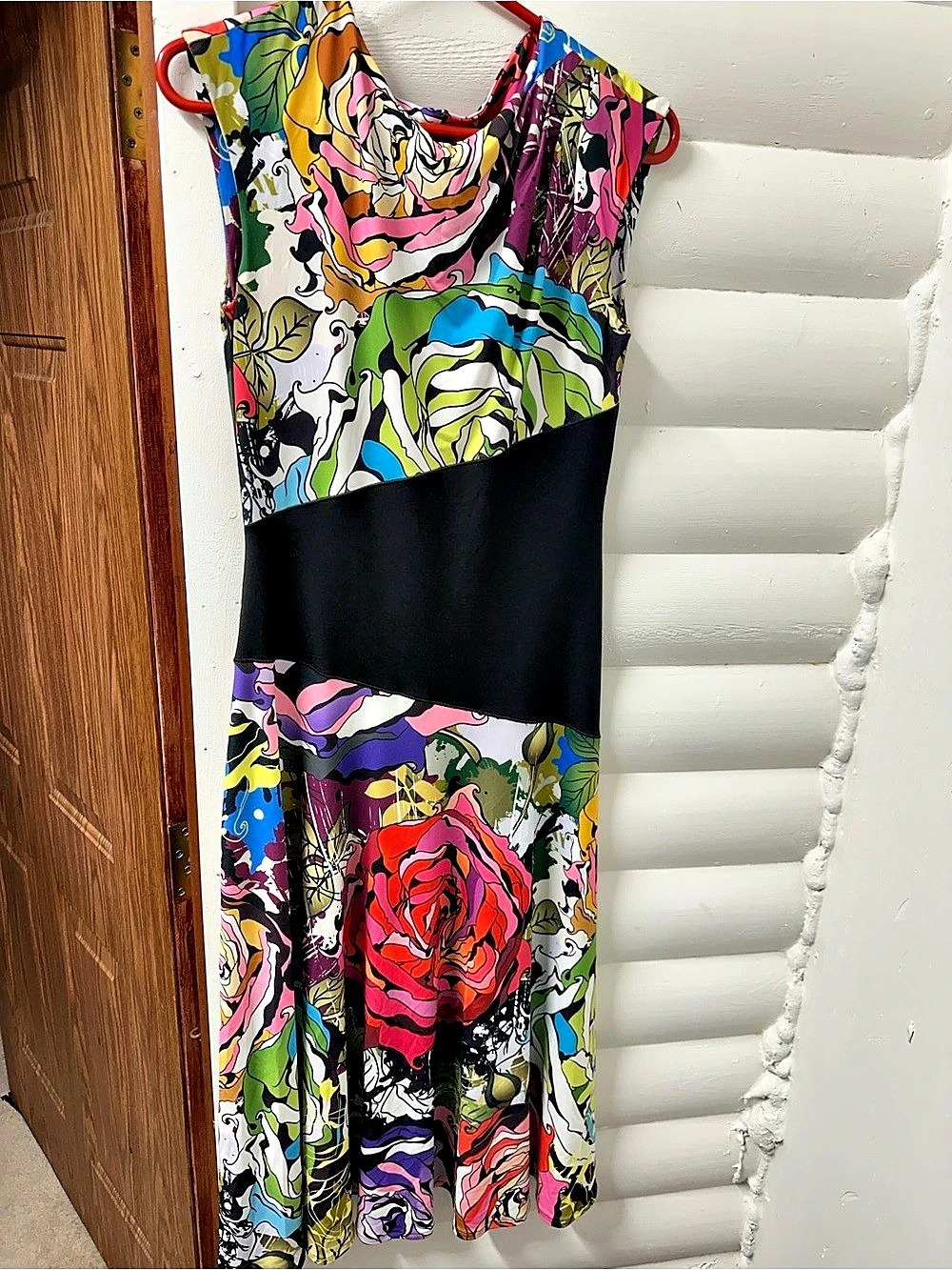 Floral Midi Dress in Black & Multicolor Like New black asymmetrical waist
Tags